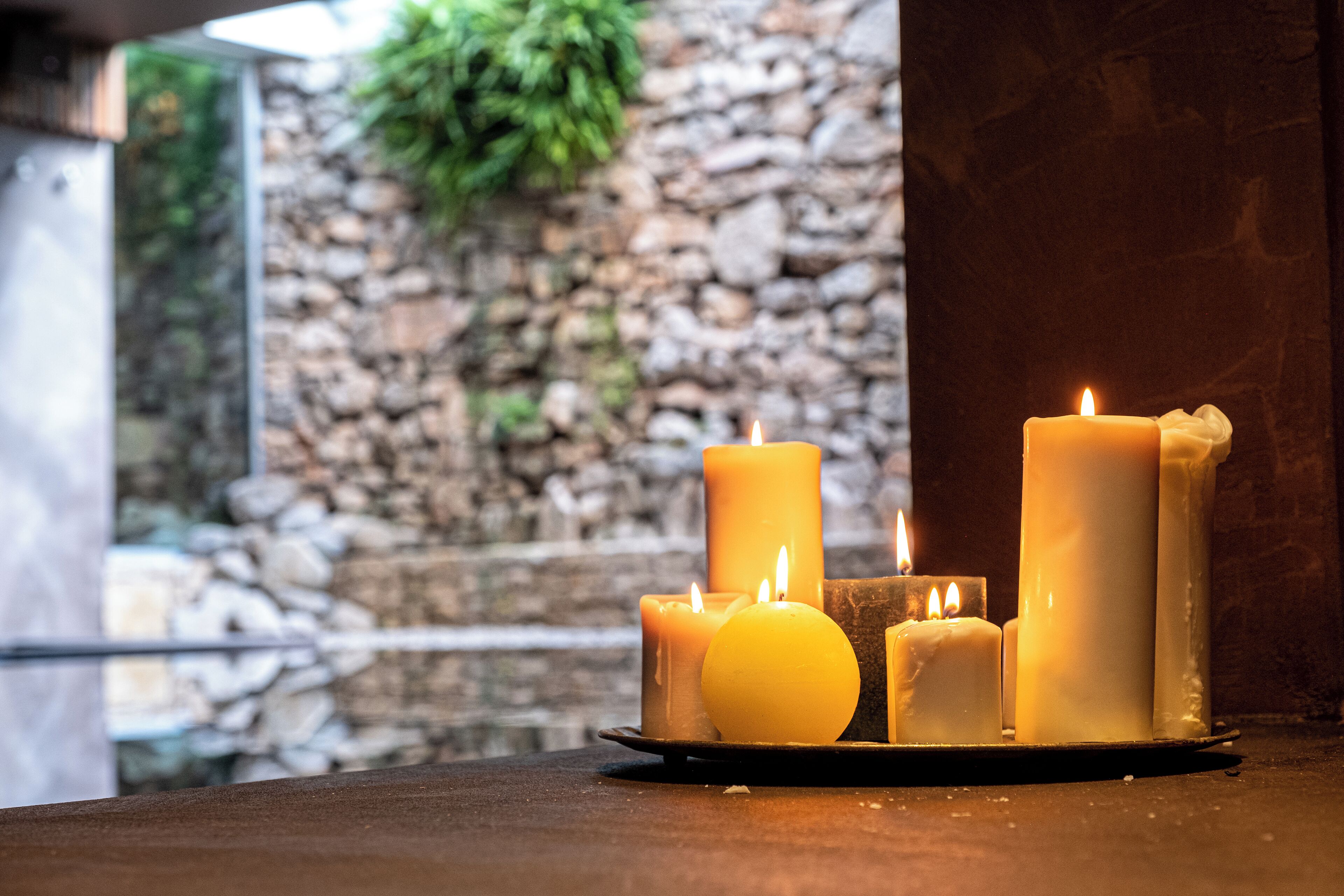 A set of candles on a tray.