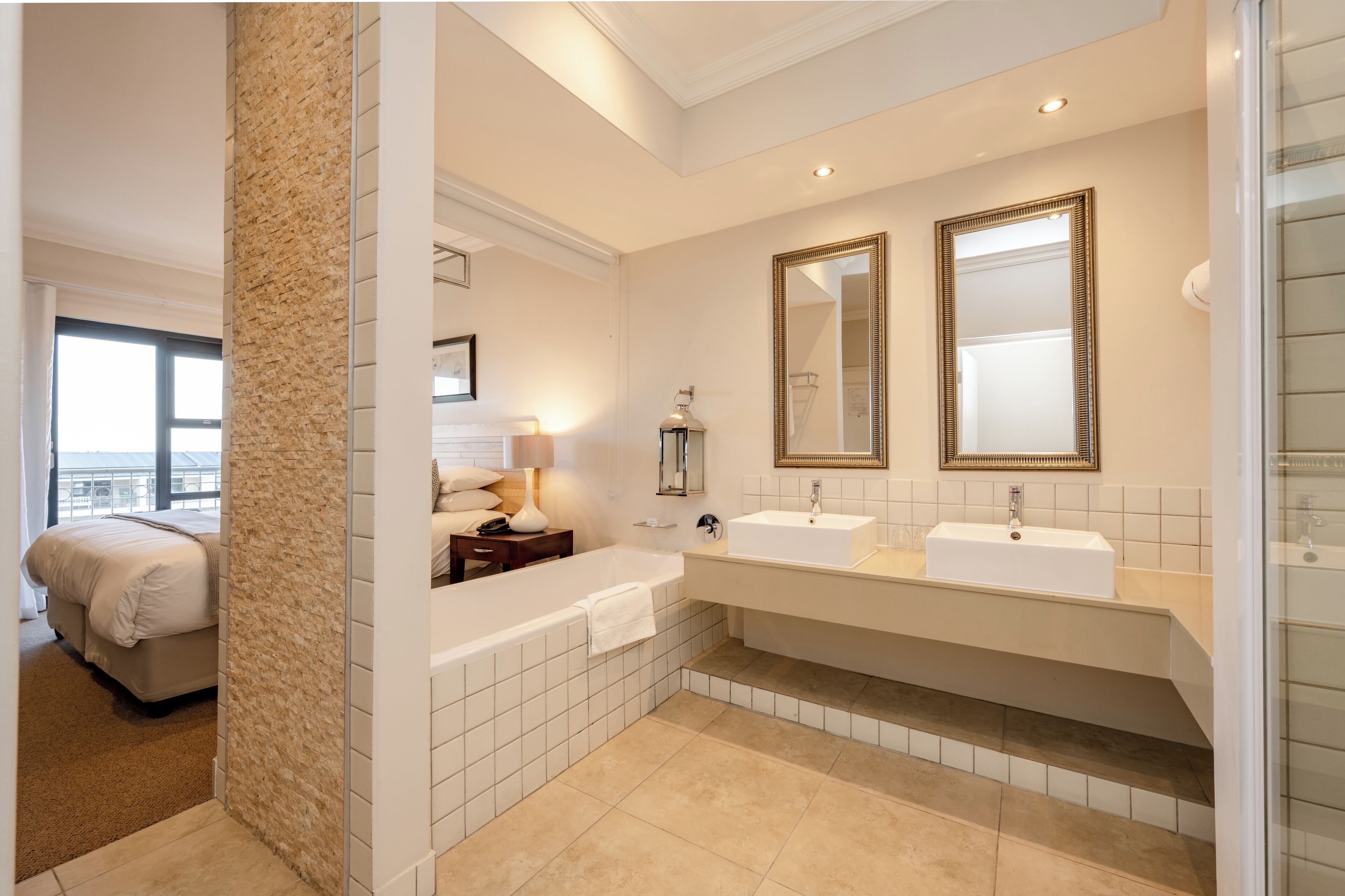 sky room ( harbour square) | bathroom | separate bathtub and shower, hair dryer, towels