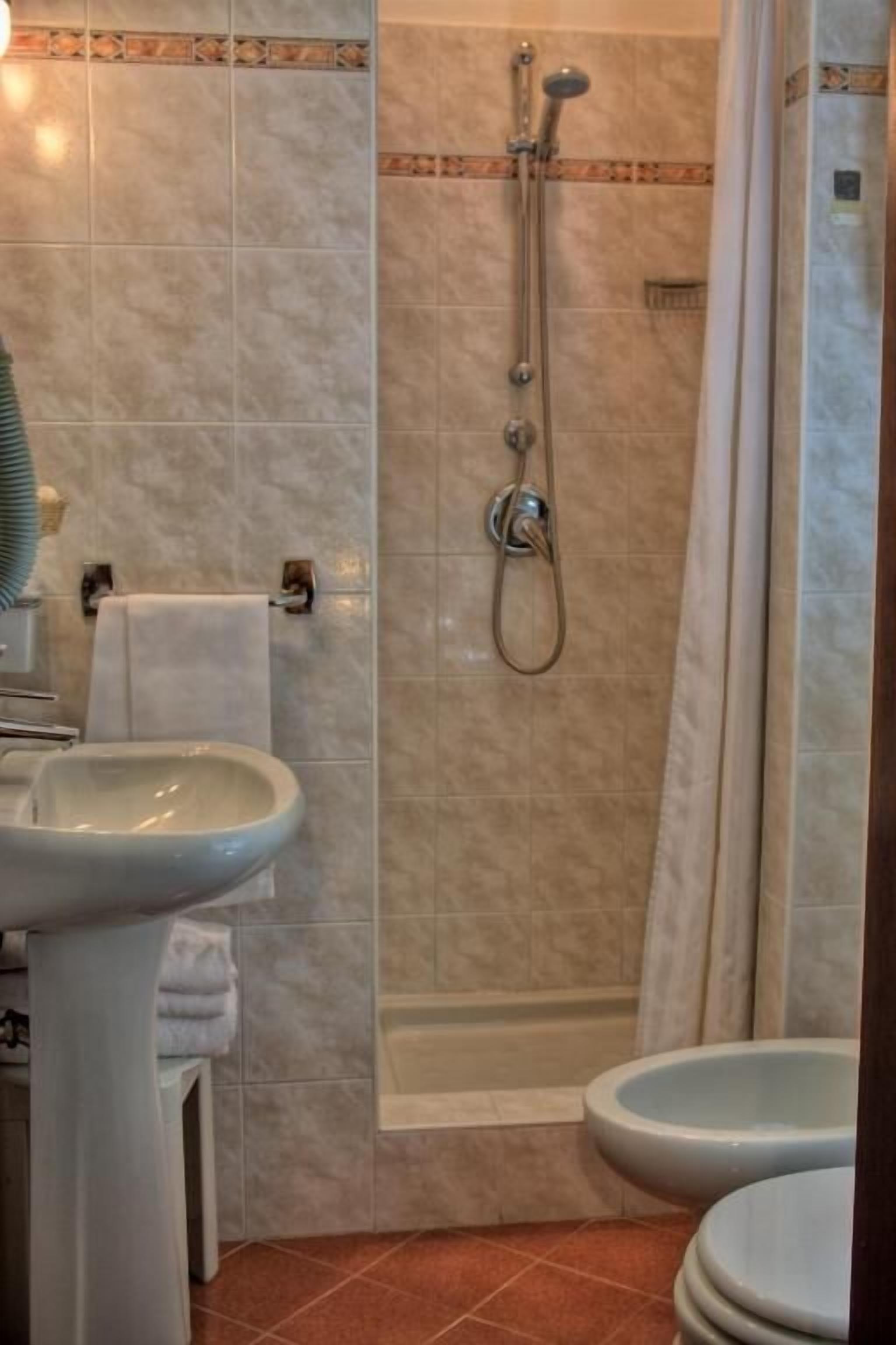 free toiletries, hair dryer, bidet, towels