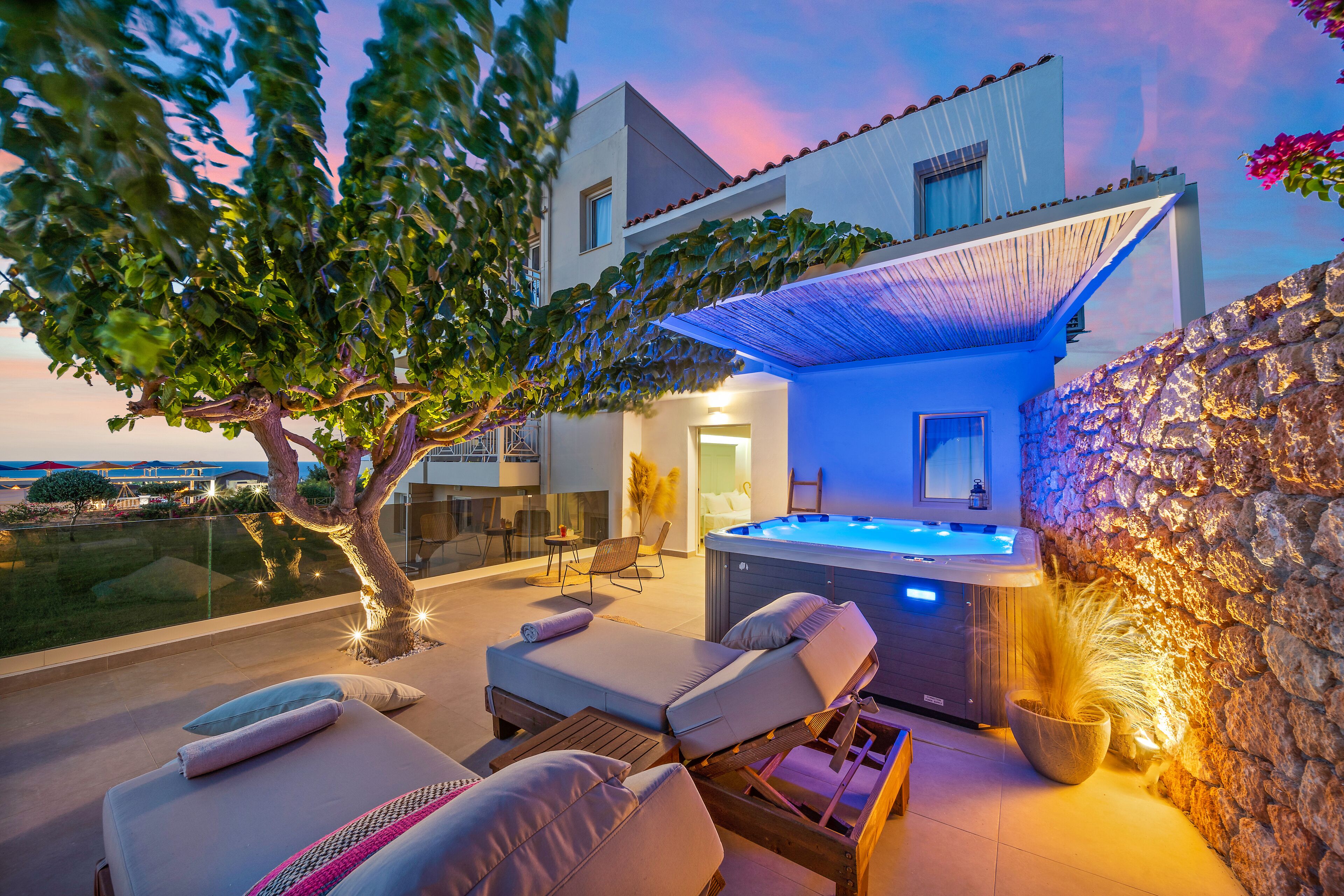 superior suite with outdoor hydrojet and sea view | premium bedding, in-room safe, individually decorated, desk