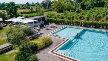 Seasonal outdoor pool, pool umbrellas, pool loungers