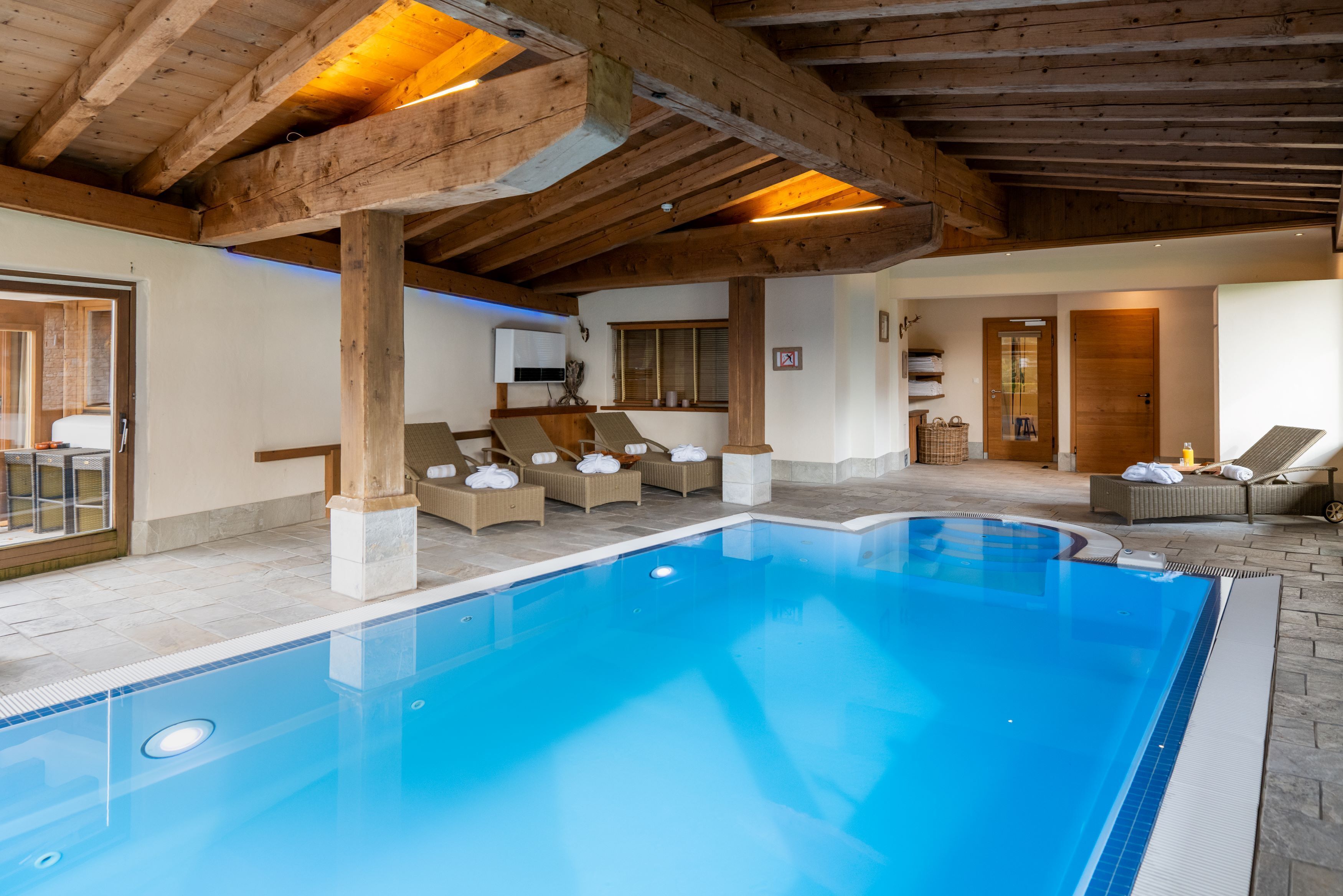 indoor pool, open 8:00 am to 8:00 pm, pool loungers