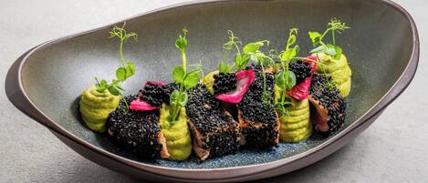 A dish with various garnishes and a unique presentation.