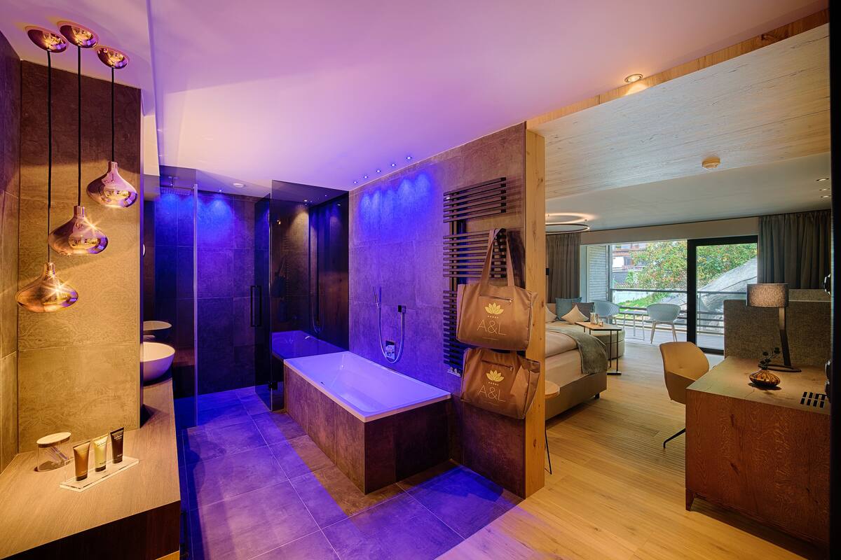 suite | bathroom | hair dryer, bathrobes, slippers, towels