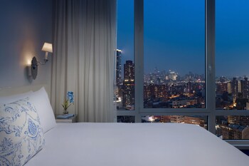 Deluxe Room, 1 King Bed | Egyptian cotton sheets, premium bedding, down comforters, in-room safe at NoMo SoHo