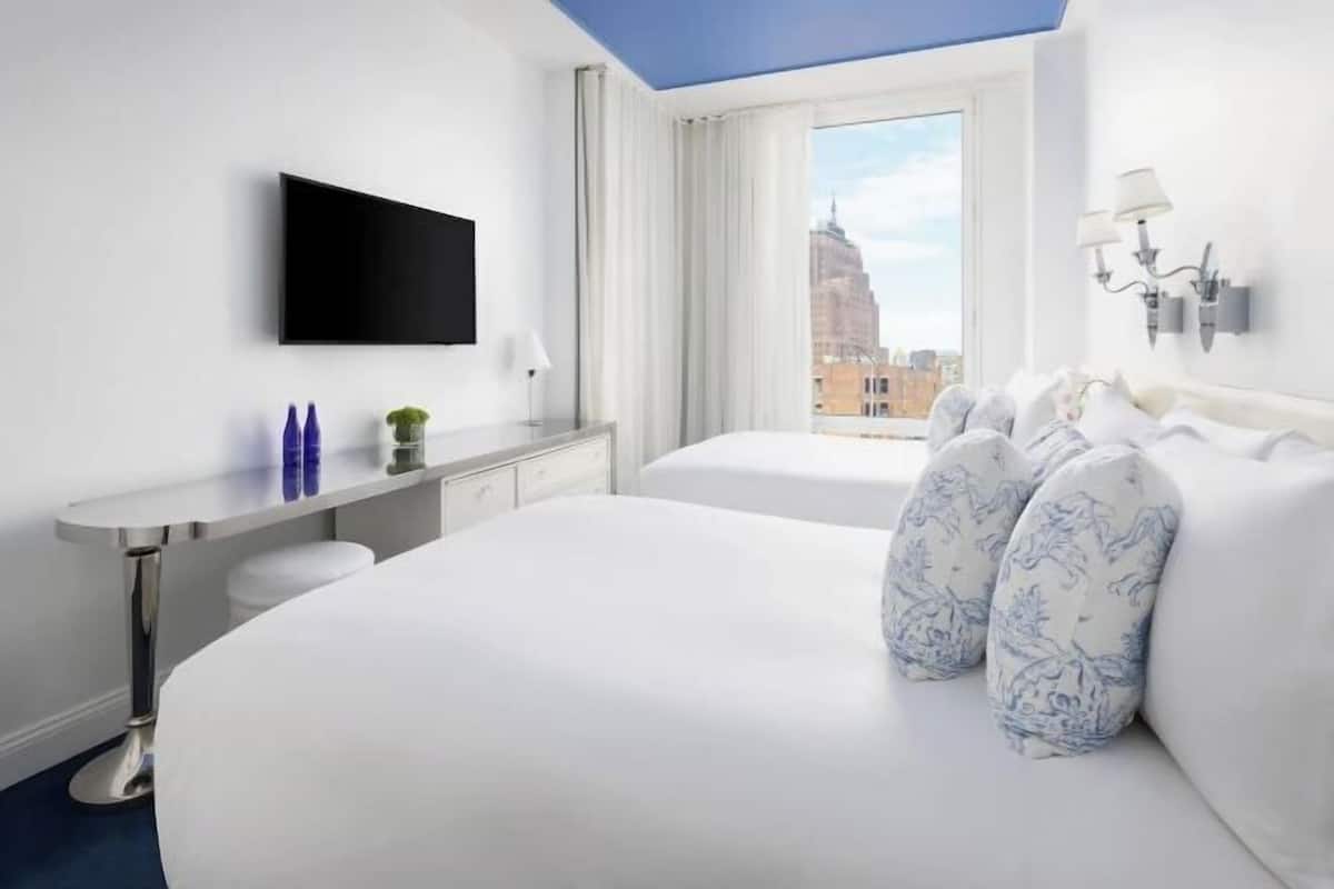 Egyptian cotton sheets, premium bedding, down comforters, in-room safe