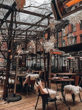 Breakfast, lunch, dinner served; American cuisine, garden views  at NoMo SoHo