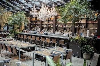 Breakfast, lunch, dinner served; American cuisine, garden views  at NoMo SoHo