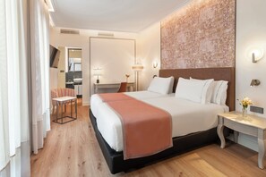 Luxe beddengoed, een kluis op de kamer, een bureau, gratis wifi