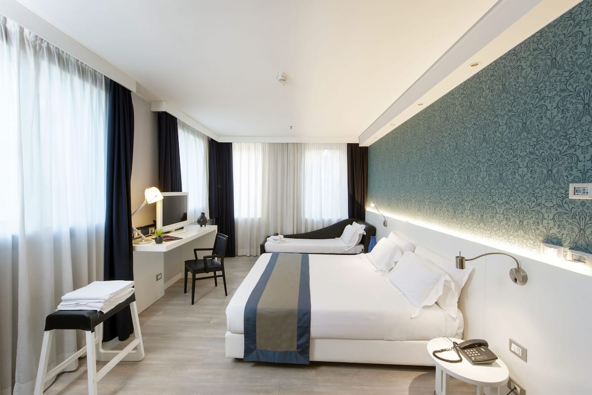 family triple room | hypo-allergenic bedding, down duvets, minibar, in-room safe