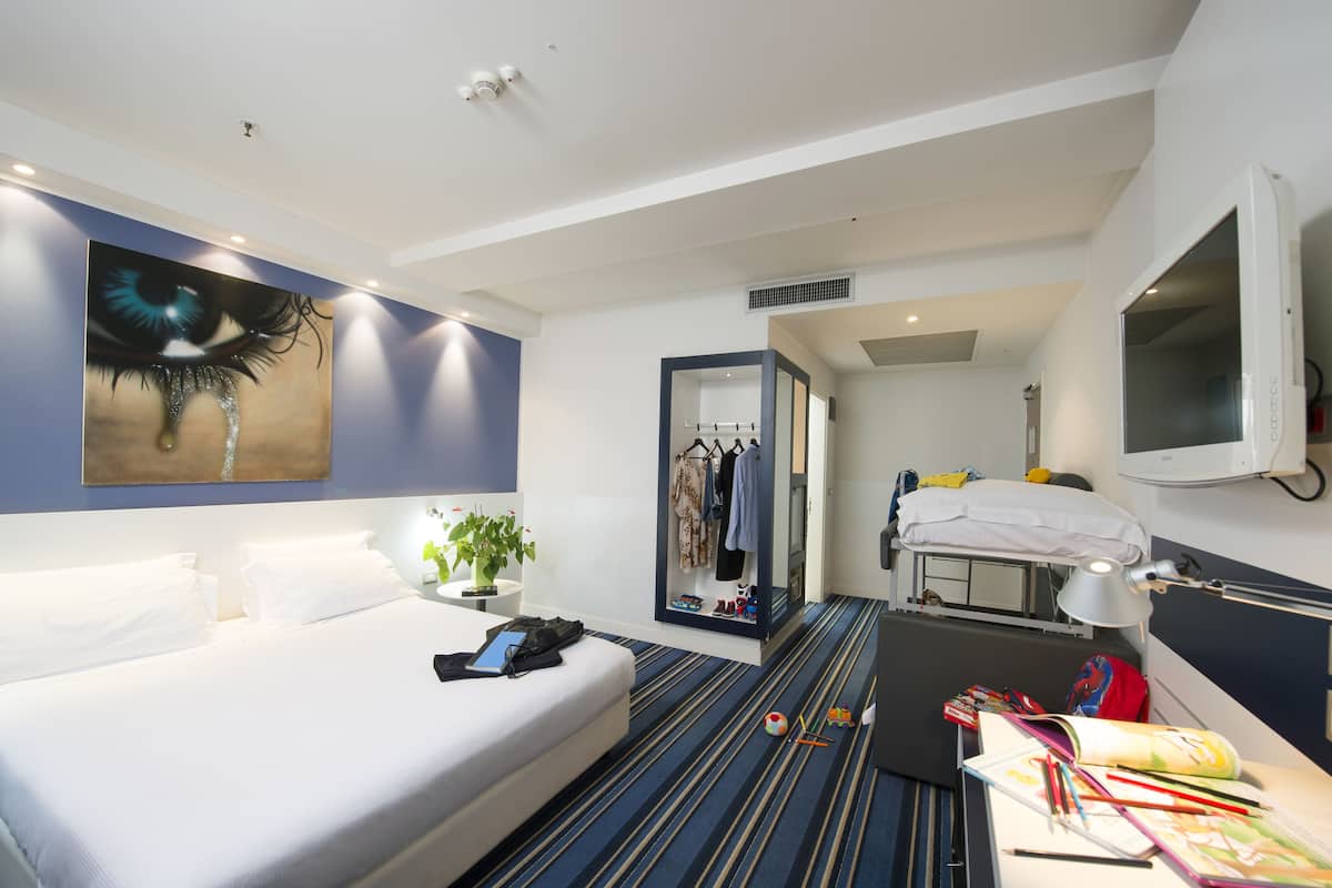 Family Quadruple Room | Hypo-allergenic bedding, down comforters, minibar, in-room safe