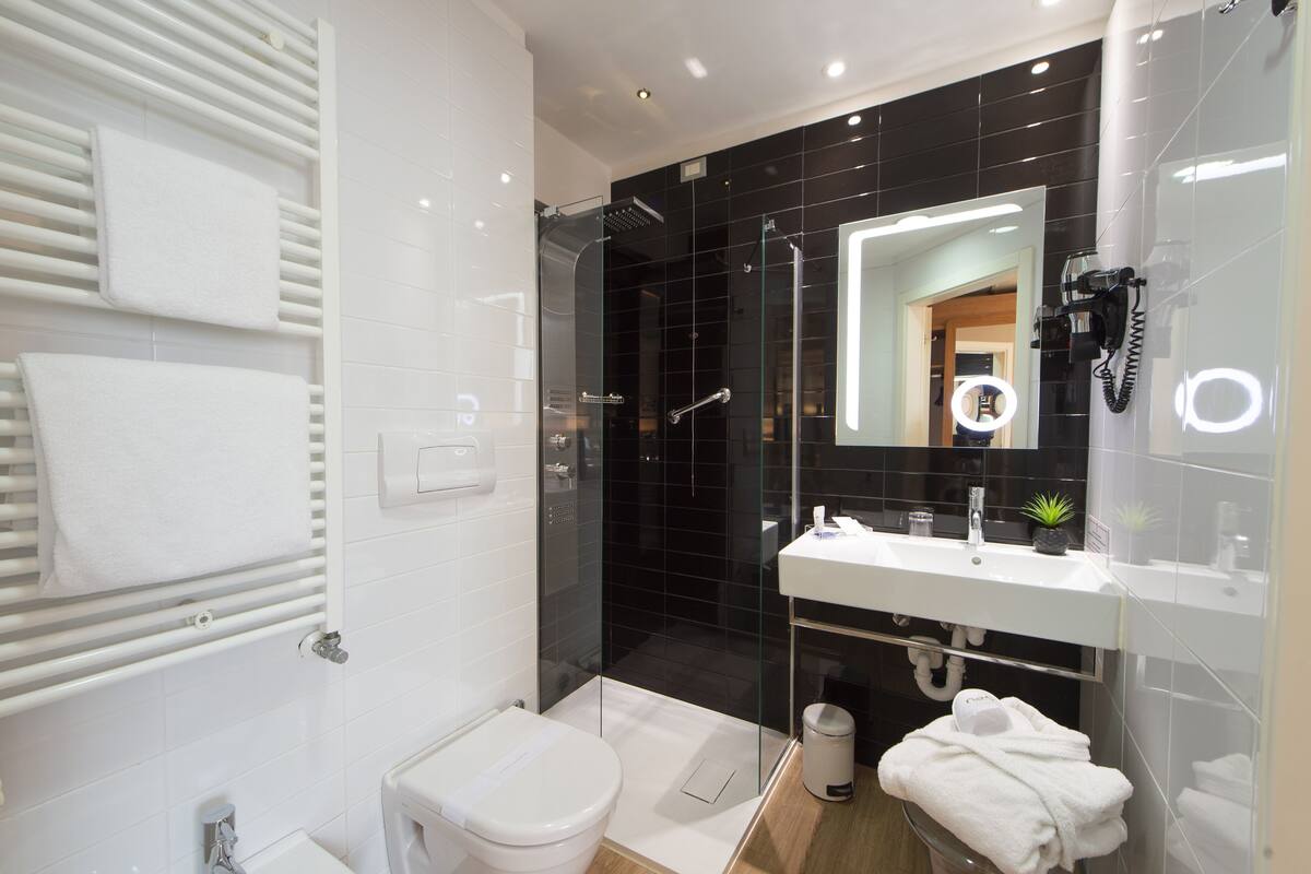 shower, eco-friendly toiletries, hair dryer, bidet