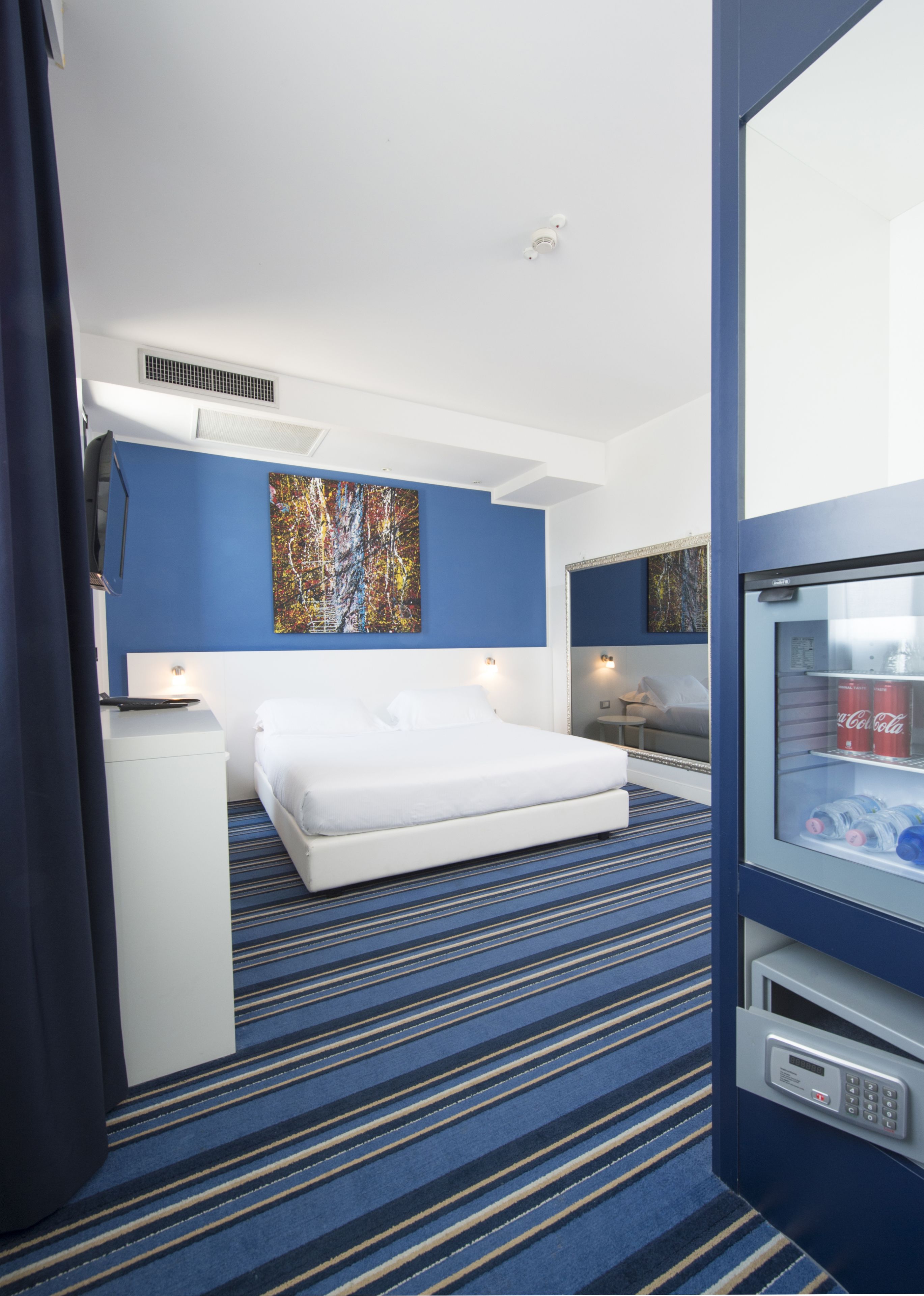 hypo-allergenic bedding, down duvets, minibar, in-room safe