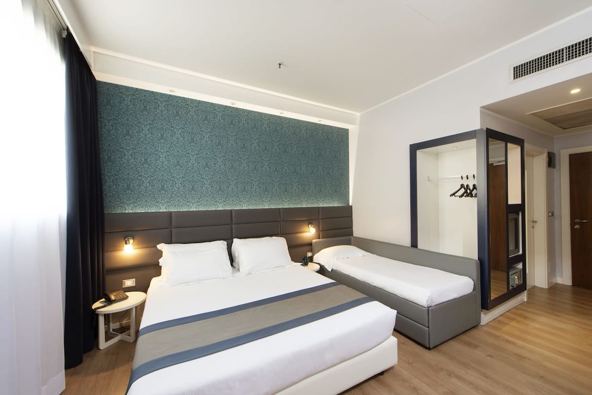 hypo-allergenic bedding, down duvets, minibar, in-room safe