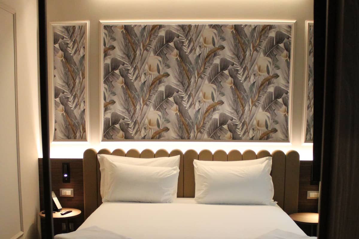 Hypo-allergenic bedding, down duvets, minibar, in-room safe