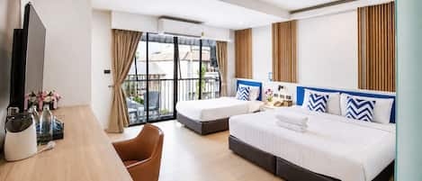 Triple Deluxe Balcony | Premium bedding, pillowtop beds, in-room safe, desk