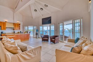 Three Bedroom Penthouse | Living area | 40-inch flat-screen TV with cable channels, TV