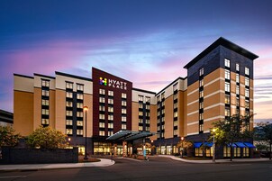 A multi-story hotel with a prominent sign reading "Hyatt Place".