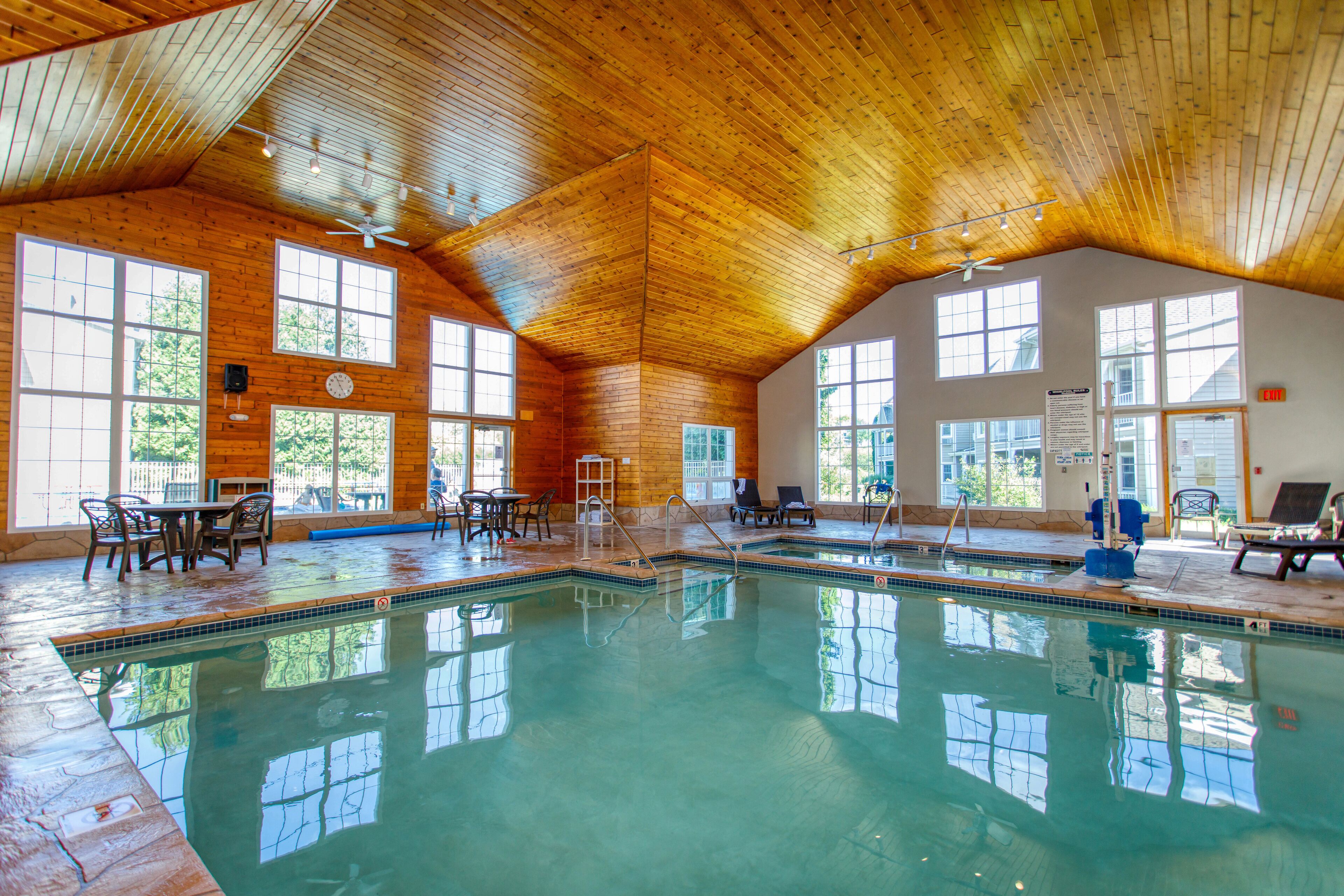 indoor pool, seasonal outdoor pool, pool umbrellas, pool loungers