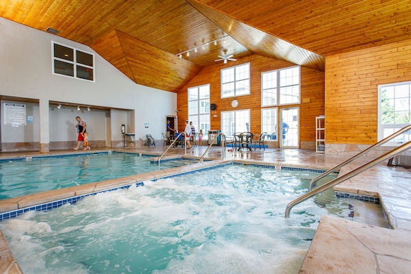 Indoor pool, seasonal outdoor pool, pool umbrellas, sun loungers