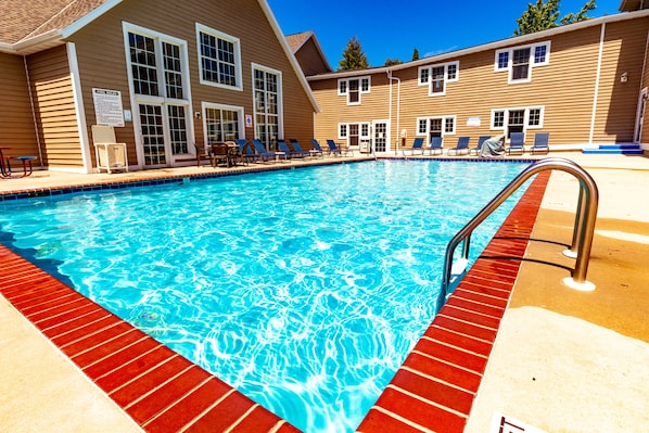 Indoor pool, seasonal outdoor pool, pool umbrellas, pool loungers