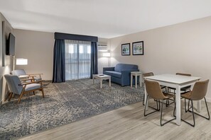 Desk, laptop workspace, blackout curtains, iron/ironing board