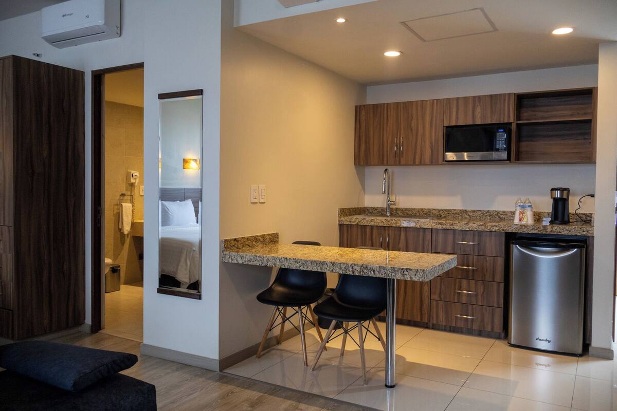 Ropa de cama de alta calidad y minibar