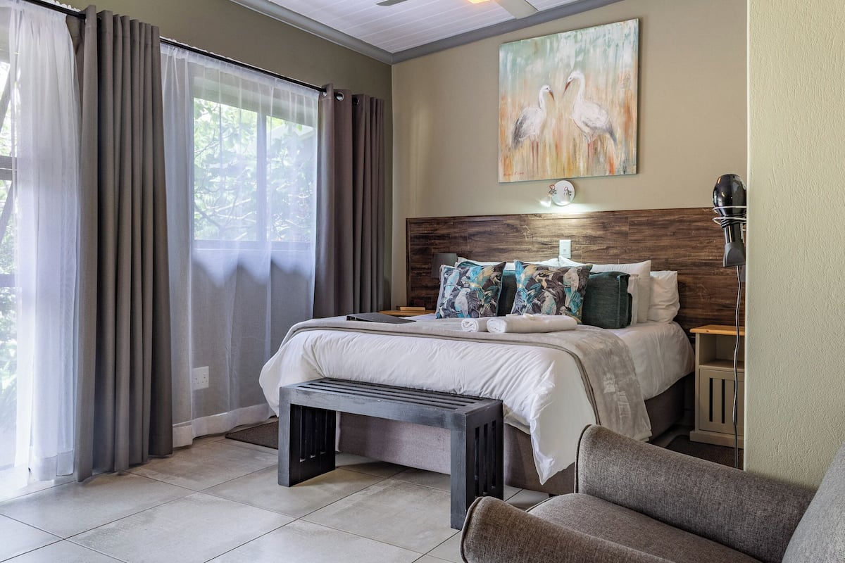 Familierom, hageutsikt (Family Suite with Garden View) | Sengetøy av topp kvalitet, individuelt dekorert og individuelt innredet