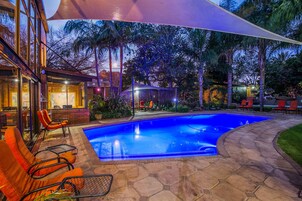 Outdoor pool, pool umbrellas, sun loungers