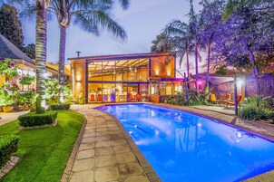 Outdoor pool, pool umbrellas, sun loungers