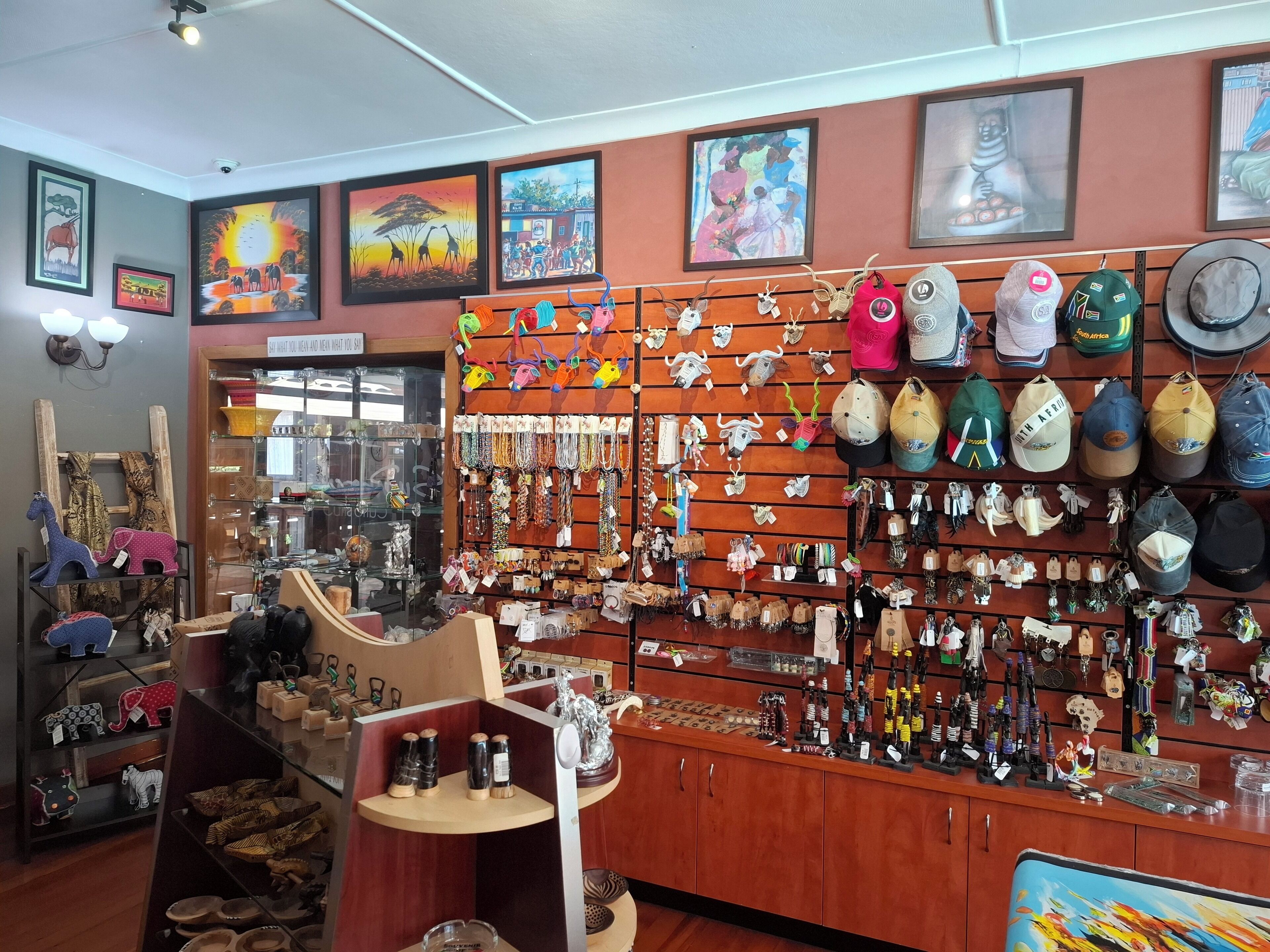 A jewelry store with various items displayed on shelves and hanging.