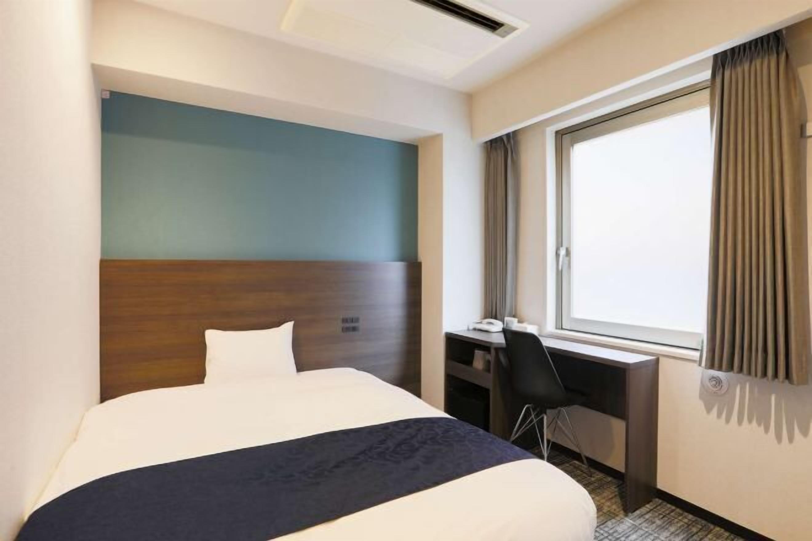 Down comforters, desk, blackout drapes, soundproofing