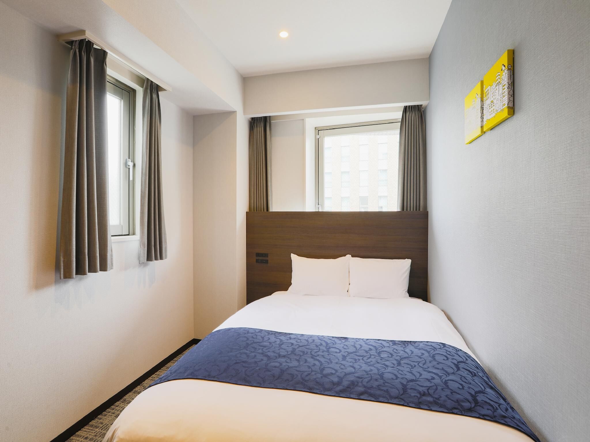 Down comforters, desk, blackout drapes, soundproofing