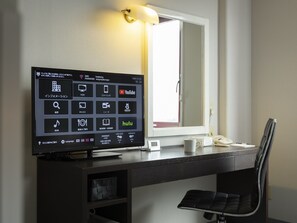 Skrivbord, strykjärn/strykbräda, gratis wi-fi och sängkläder