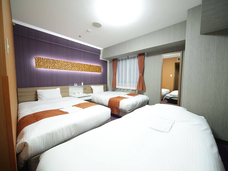 Down comforters, desk, blackout drapes, iron/ironing board