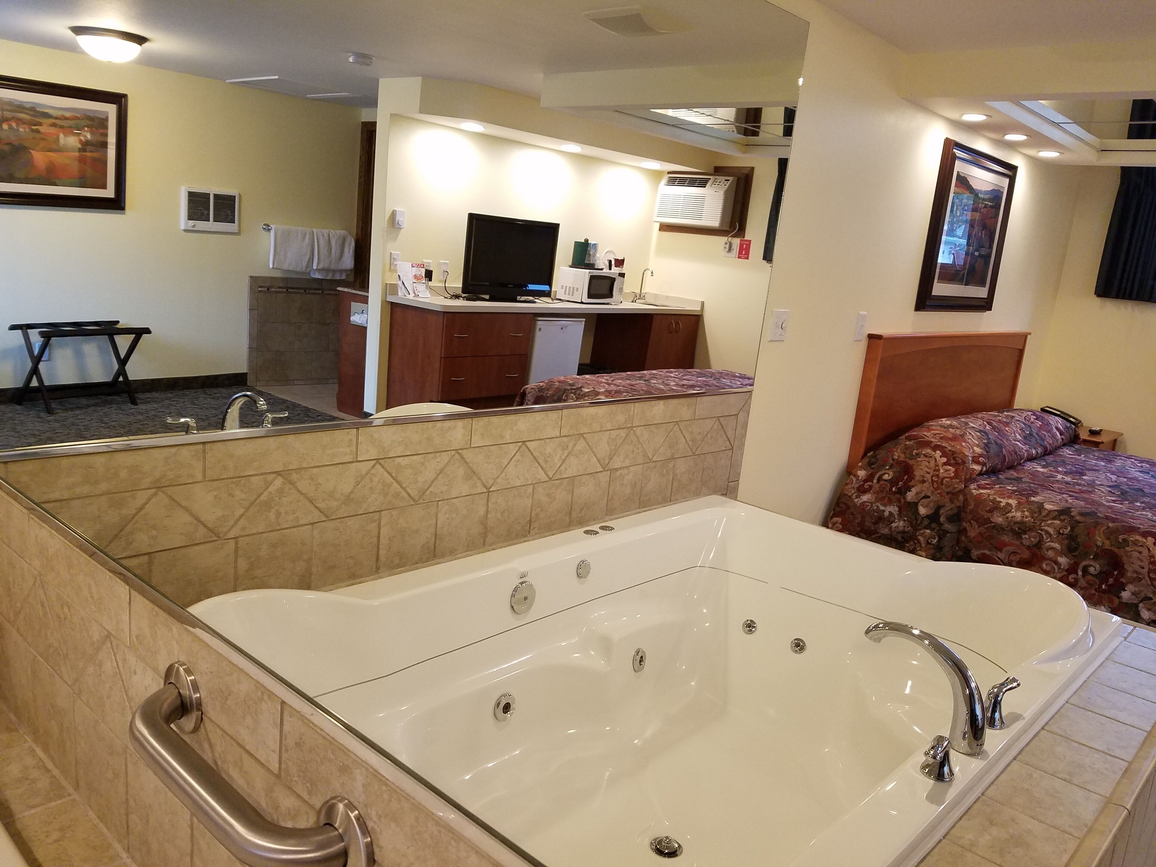 Premium bedding, laptop workspace, blackout curtains, free WiFi