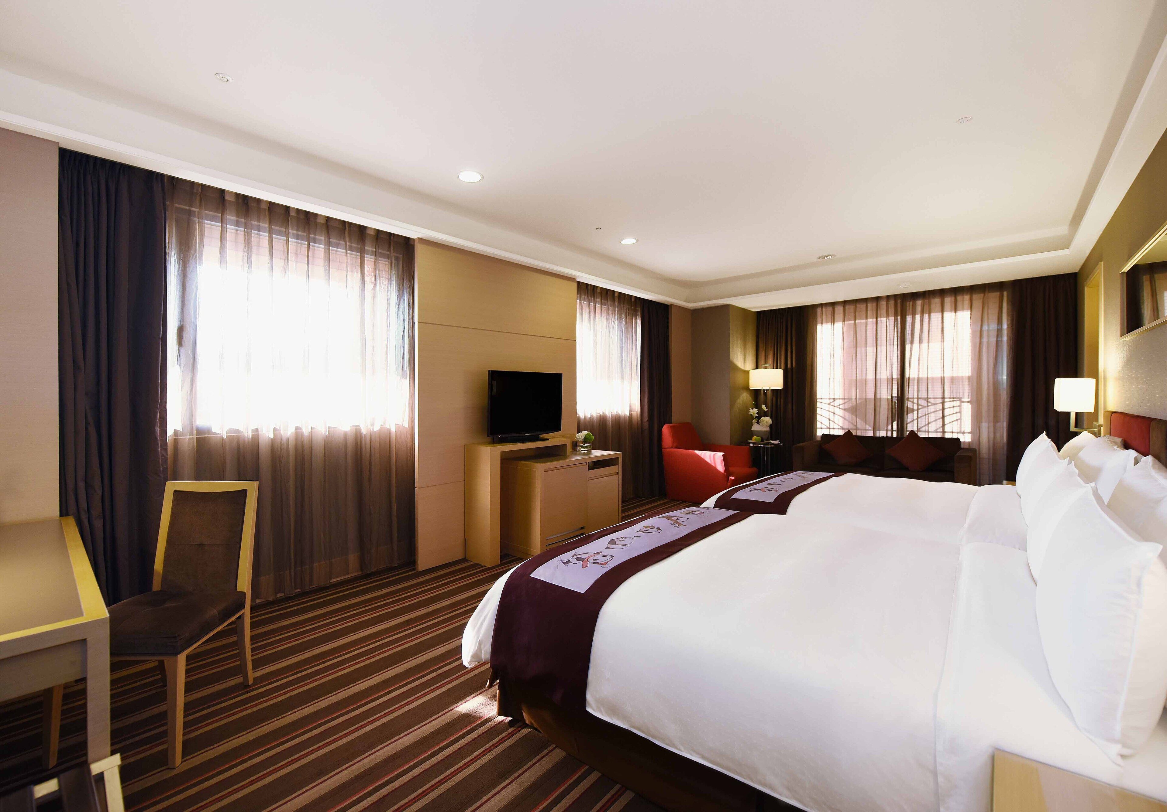 deluxe twin room, 2 double beds | in-room safe, blackout curtains, free wired internet, bed sheets