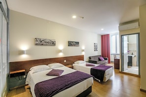 Chambre Triple Standard, vue ville