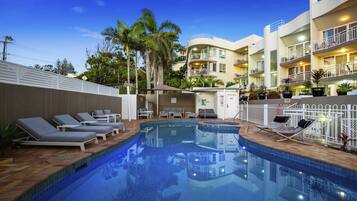 Outdoor pool, pool umbrellas, sun loungers