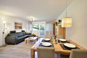 Premium Apartment, Balcony | Living area | TV, toys