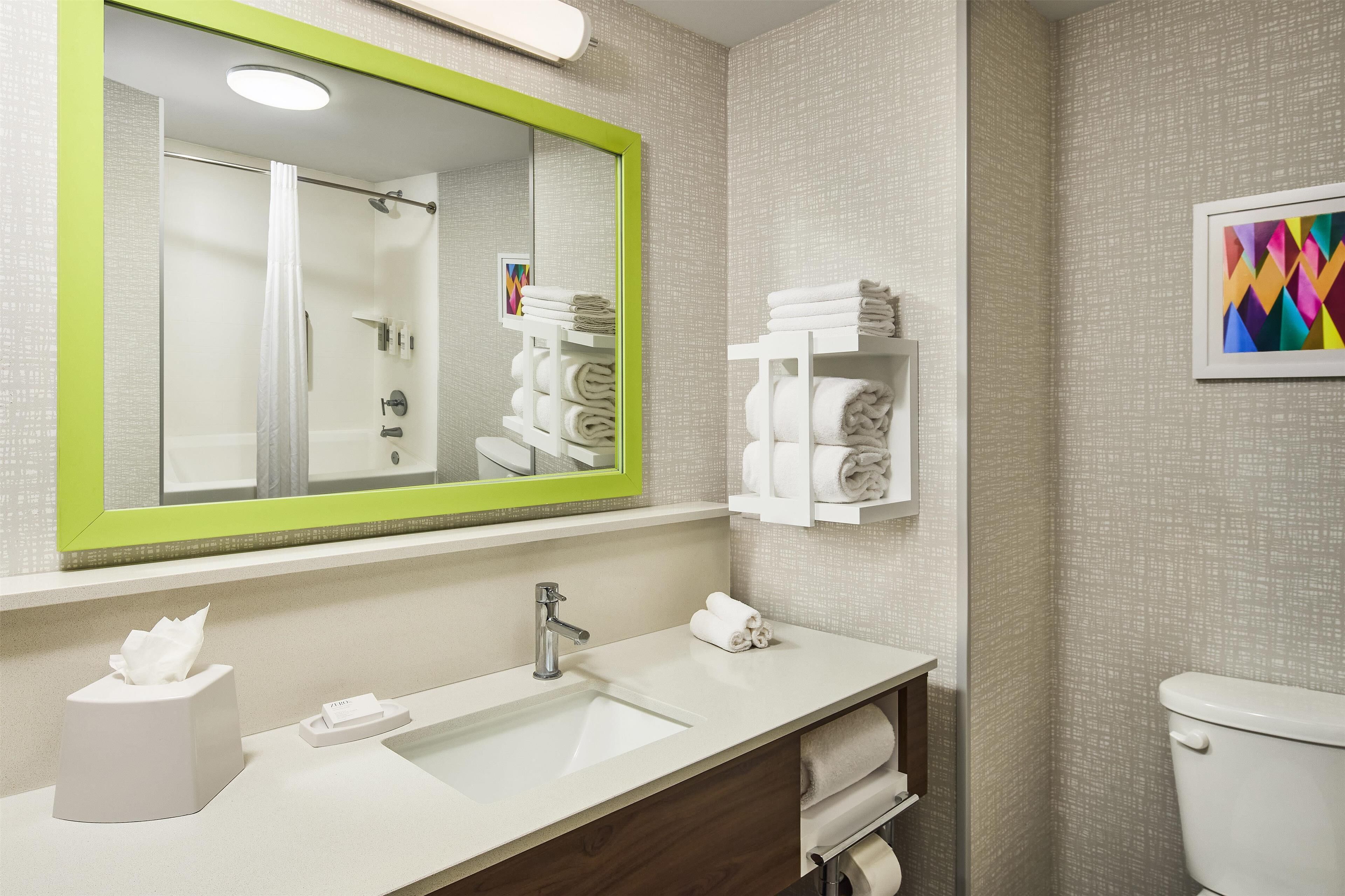 two queens | bathroom | combined shower/bathtub, free toiletries, hair dryer, towels