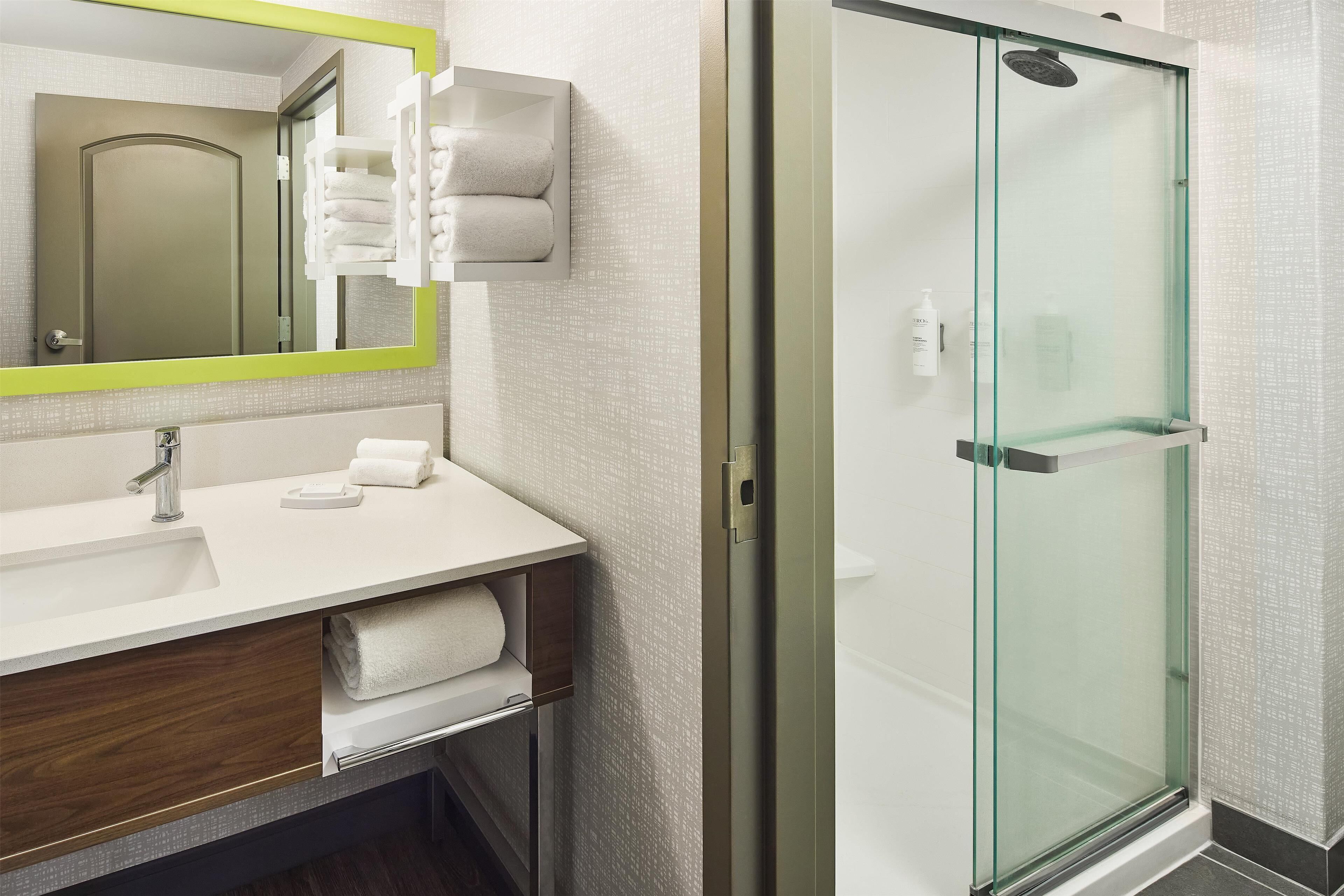 room, 1 queen bed (shower only, separate vanity) | bathroom | combined shower/bathtub, free toiletries, hair dryer, towels