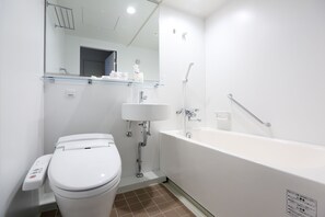 Ensemble douche/baignoire, articles de toilette gratuits, sèche-cheveux