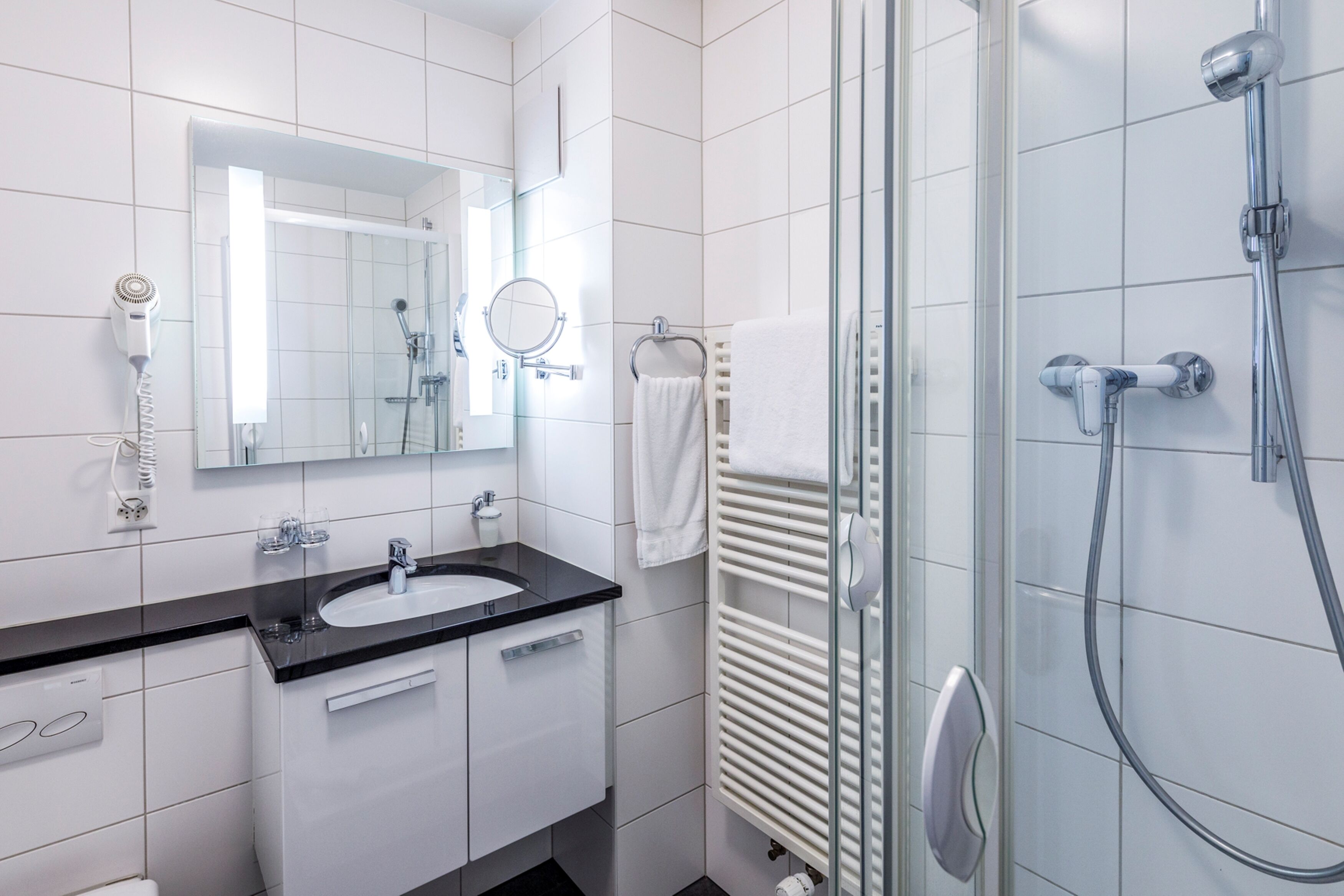 shower, free toiletries, hair dryer, towels