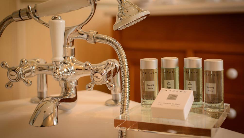 bathtub, jetted bath, designer toiletries, hair dryer