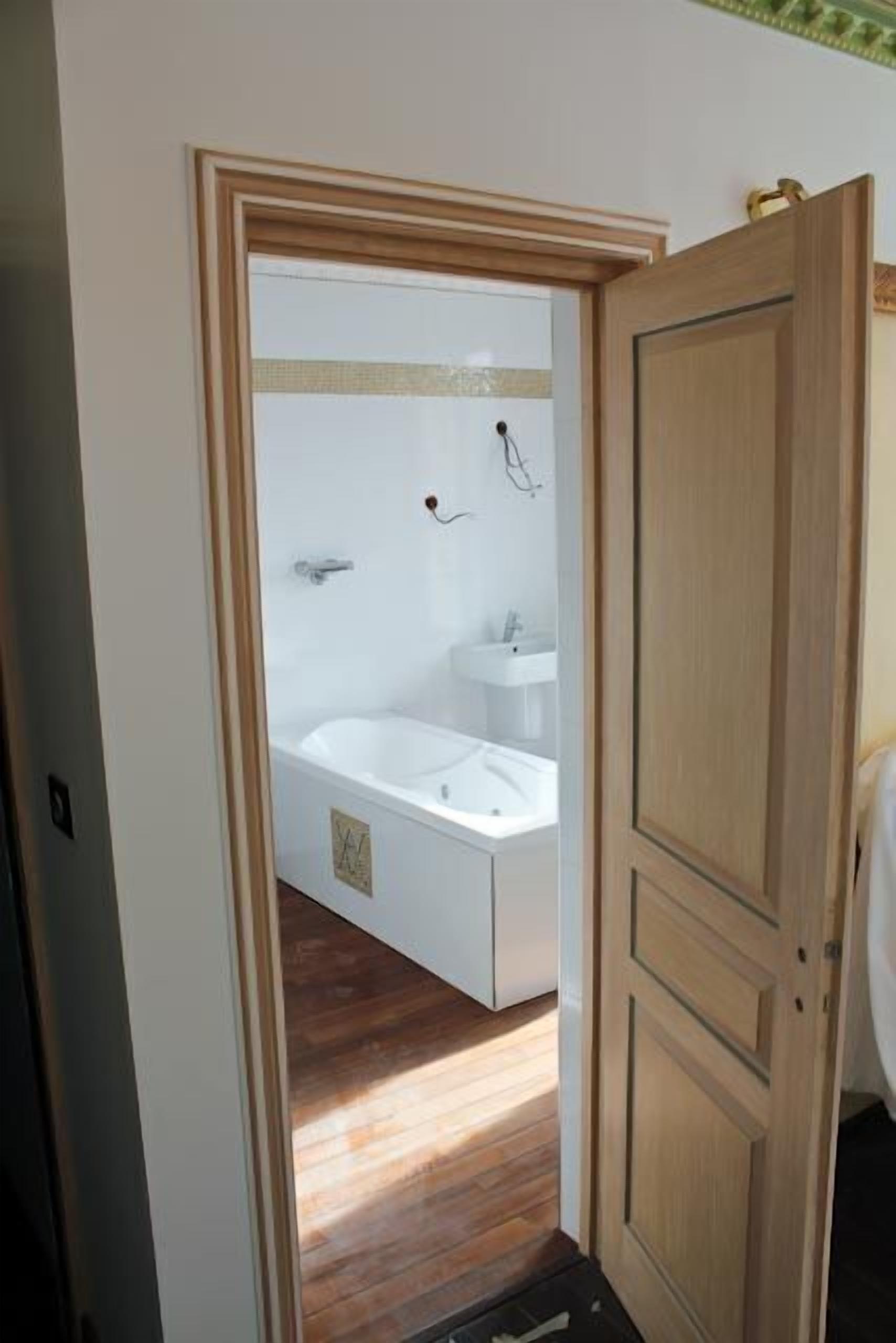 superior double room | bathroom | bathtub, jetted bath, designer toiletries, hair dryer