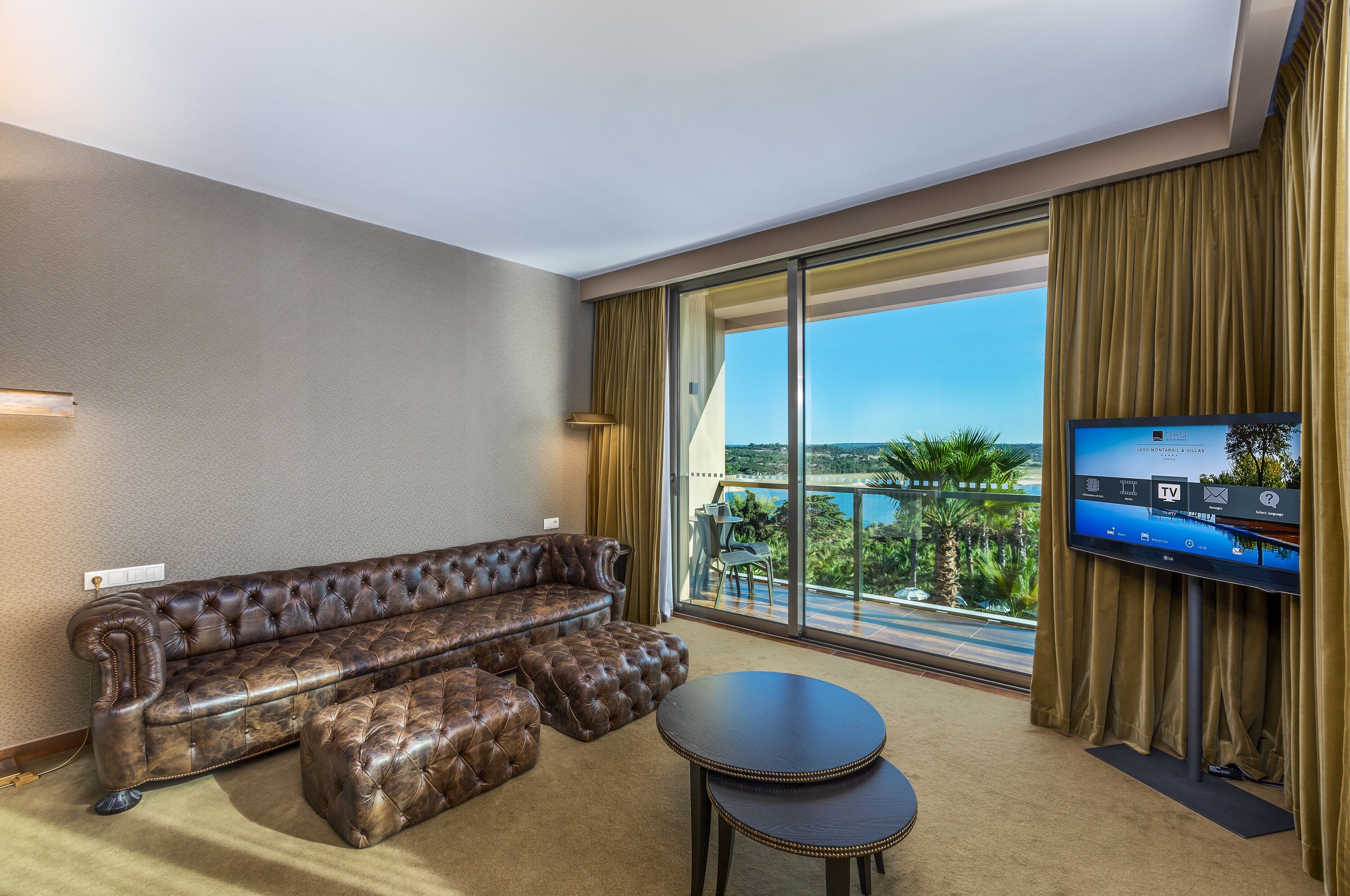 suite, lake view (master) | living room | 40-inch lcd tv with satellite channels, tv, pay films