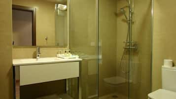 Shower, rainfall showerhead, hair dryer, towels