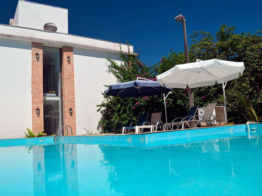 Outdoor pool, open 9:00 AM to 9:00 PM, pool umbrellas, sun loungers