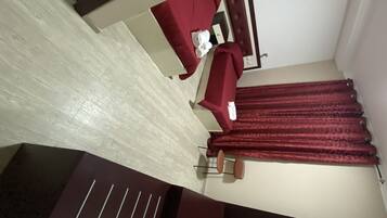 Chambre Double Supérieure | Coin séjour